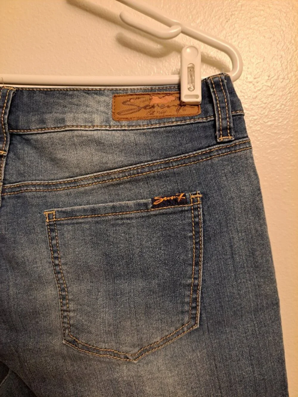 Seven7 Boho denim shorts featuring distinctive embroidered side detailing